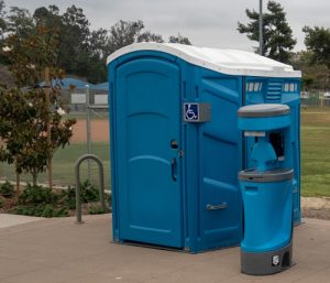 ada porta potty at a baseball game